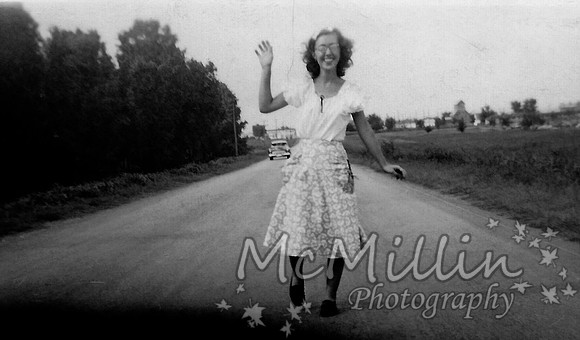 1951 Lois Owen running crazy in the road