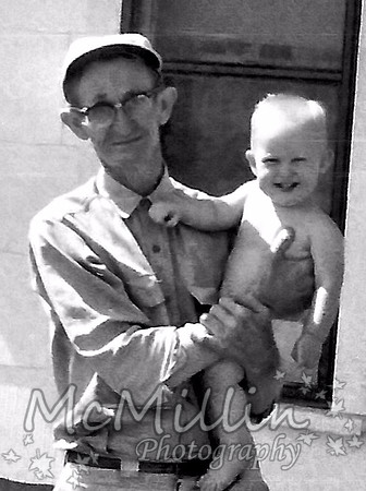 1957 Floyd Owen holding Ricky McMillin