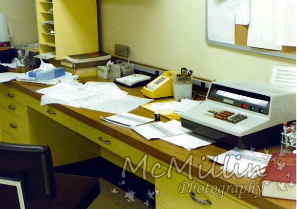 1978 Med Arts desk area with ancient calculator