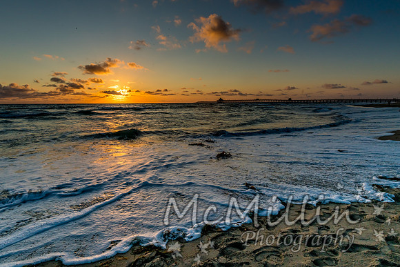 California ocean golden sunset with surf